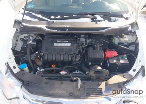 2012 Honda Insight from USA, damaged, VIN JHMZE2H37CS005710